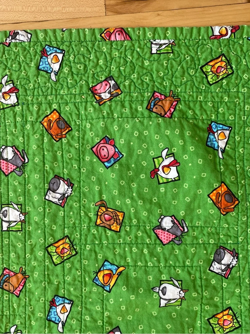 Quack, Moo, Oink quilt with farm animals and 'Quack, Moo, Oink'